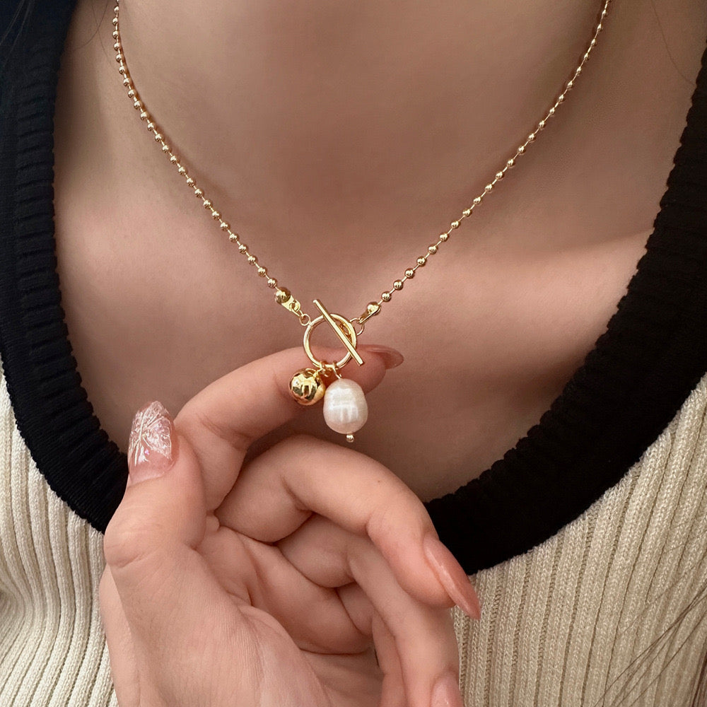 Pearl and ball necklace